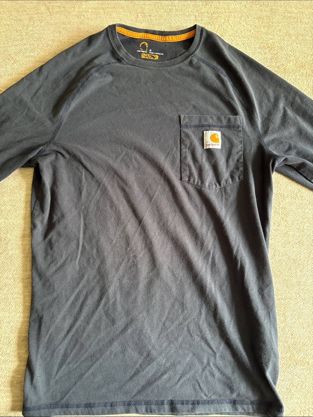 Carhartt Men’s Black Long-Sleeve Pocket Tee with Gold Logo Trim